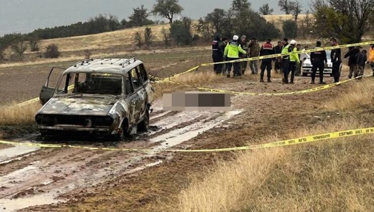 Dağlık alanda yanmış aracın yanında başsız erkek cesedi bulundu